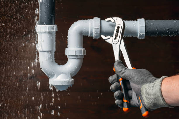 Professional Plumbing technician working in Cable, OH